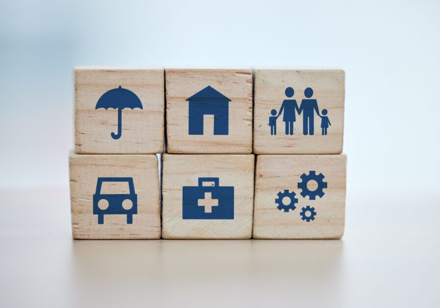 Wooden, cubes or stack in house risk management, security or future protect on background desk mockup or home table. Zoom, building blocks or life insurance in medical, car loan or mock up cog wheel